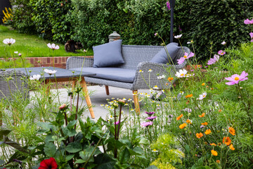 Garden seating next to the flower border