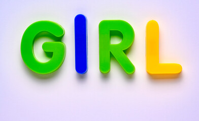 Plastic letters spelling GIRL