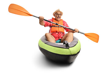 Mature man paddling in a kayak - obrazy, fototapety, plakaty