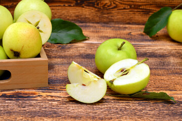 still life with green apples, cut apple