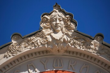 Obraz premium Russia. Pskov region. Pskov. Bas-relief of a woman's face on the building of the Pskov Academic Drama Theater named after A.S. Pushkin