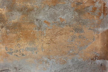 old concrete wall with bronze paint stains