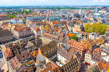 Fototapeta na wymiar Skyline aerial view of Strasbourg old town, Grand Est region, France. Strasbourg Cathedral. View to the West side