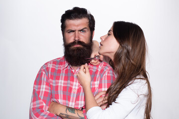 Beardcare procedures. Barbershop advertising. Facial hair trimming. Serious bearded man in barber shop.