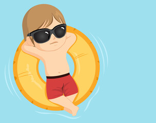 Cute little toddler boy wearing sunglasses making cool pose on inflatable ring at swimming pool