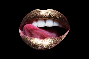 Sexy lips. Closeup sexy beautiful female golden lips isolated. Gold lipstick. Beauty fashion gold...