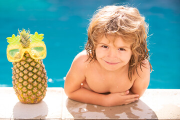 Kids Swimming Pool Concept. Summer vacation. Relax in spa swimming pool. Children playing in pool. Summer pineapple fruit.