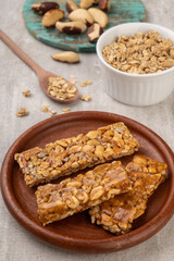 Homemade cereal bars with nuts, muesli and honey