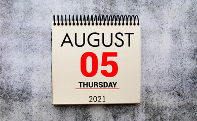 Save the Date written on a calendar - August 05