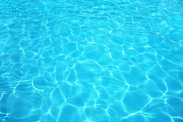 Naklejka na ściany i meble Summer resort water reflection, water ripple under bright sunny sky. 