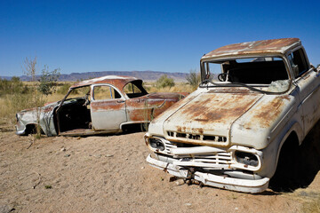 Fototapeta premium Abandoned vehicles in desert, Solitaire, Namibia
