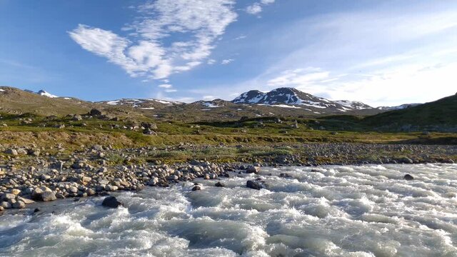 Pan shot of Muru River at Jotunheimen National Park Norway