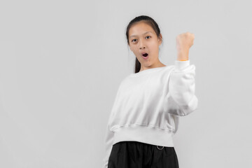 Asian little girl studio portrait on gray background