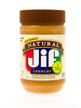 Winneconne, WI - 3 May 2015:  Jar of Jif natural peanut butter in crunchy style.