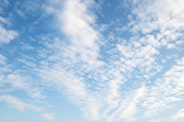 Bright Blue sky with white cloud. Beautiful sky background and wallpaper. Clear day and good weather in the morning.