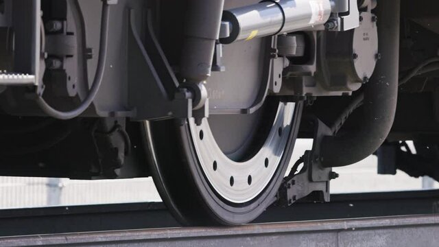 train wheels passing over the railway, closeup view in slowmotion