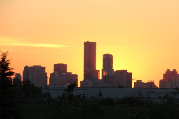 Fototapeta na wymiar Setting Sun Behind The City, Pylypow Wetlands, Edmonton, Alberta