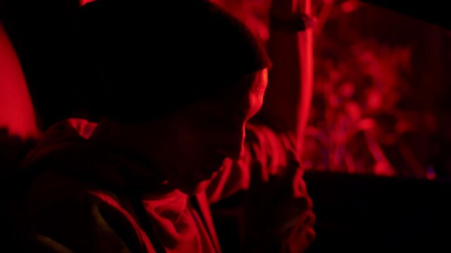 Man at the driver seat nervous under police ligths. About of being arrrested.