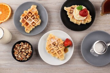 Fresh Baked Delicious Homemade Croissant Waffle with Strawberry. Top View Served on Small Cake Plate, Cream Clean Background for Advertising.
