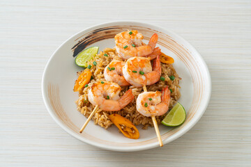 fried rice with shrimps skewers