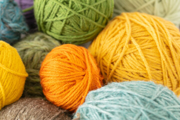 colorful yarn balls green yellow blue orange