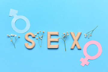 Word SEX with male and female symbols on color background