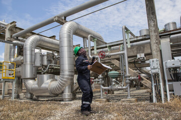 Male worker inspection pipeline oil