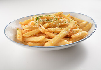 deep fried golden French fries with parmesan cheesy sauce in white background western snack cuisine halal fast food menu