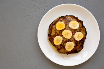 Homemade Banana Pancakes with Honey, top view. Flat lay, overhead, from above. Copy space.