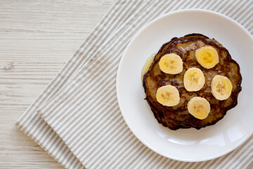 Homemade Banana Pancakes with Honey, top view. Flat lay, overhead, from above. Copy space.