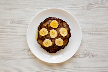 Homemade Banana Pancakes with Honey, top view. Flat lay, overhead, from above.