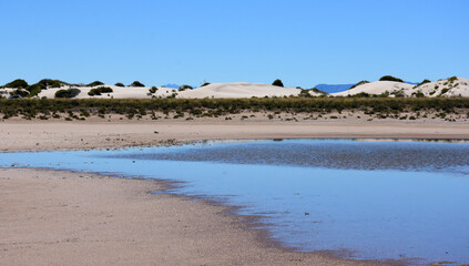 lake in the vast sand dunes of white sands national monument, near alamogorgo, new mexico