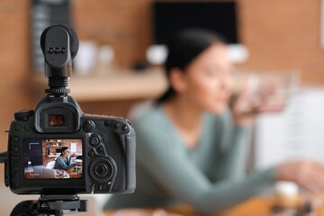 Obraz na płótnie Canvas Asian beauty blogger recording video at home
