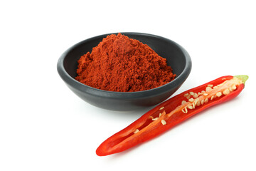 Red hot chili pepper powder and half isolated on white background