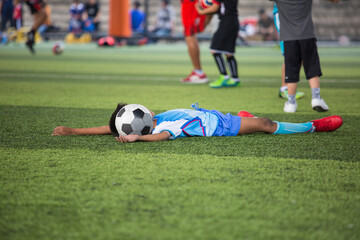 Soccer ball tactics on grass field with children warm up