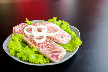 Plate with raw meat for grilled