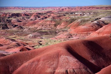 colorful badland hills in thel painted desert in late afternoon, petrified forest national park, near holbrook,  arizona