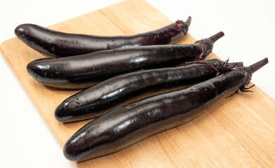 eggplant or aubergine vegetable on cutting board