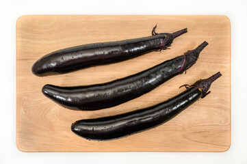 eggplant or aubergine vegetable on cutting board