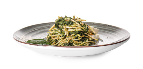 Plate with tasty pasta and spinach on white background