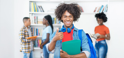 Successful cheering afro american male college student