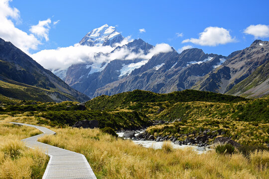 spectacular views of mount cook and the hooker river along the hooker valley track on a summer day in summer,  near mount cook village on the south island of new zealand