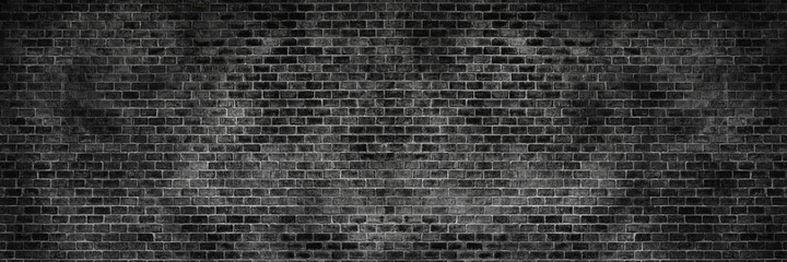Panorama old black brick texture detail background. Paint brickwork wall and copy space.