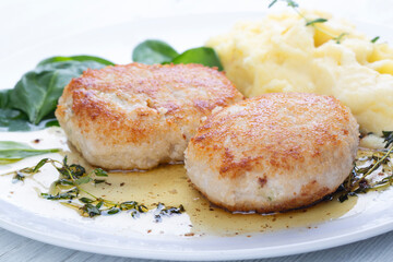 Chicken cutlets, mashed potatoes and spinach