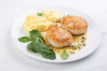 Chicken cutlets, mashed potatoes and spinach