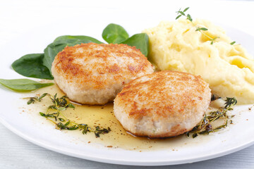 Chicken cutlets, mashed potatoes and spinach