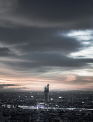 Fototapeta premium Bangkok, thailand - Jul 02, 2021 : Aerial view of Beautiful sunset over large metropol city in Asia. There are prominent and isolated high-rise buildings along the Chao Phraya River. Monotone.