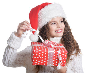 Portrait of smiling little girl with Christmas present