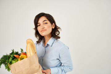 pretty woman package with groceries vegetables delivery supermarket close up