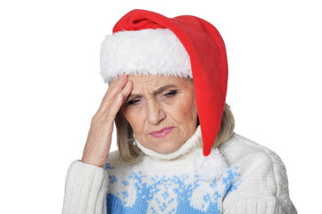 Portrait of sad senior woman in Santa hat